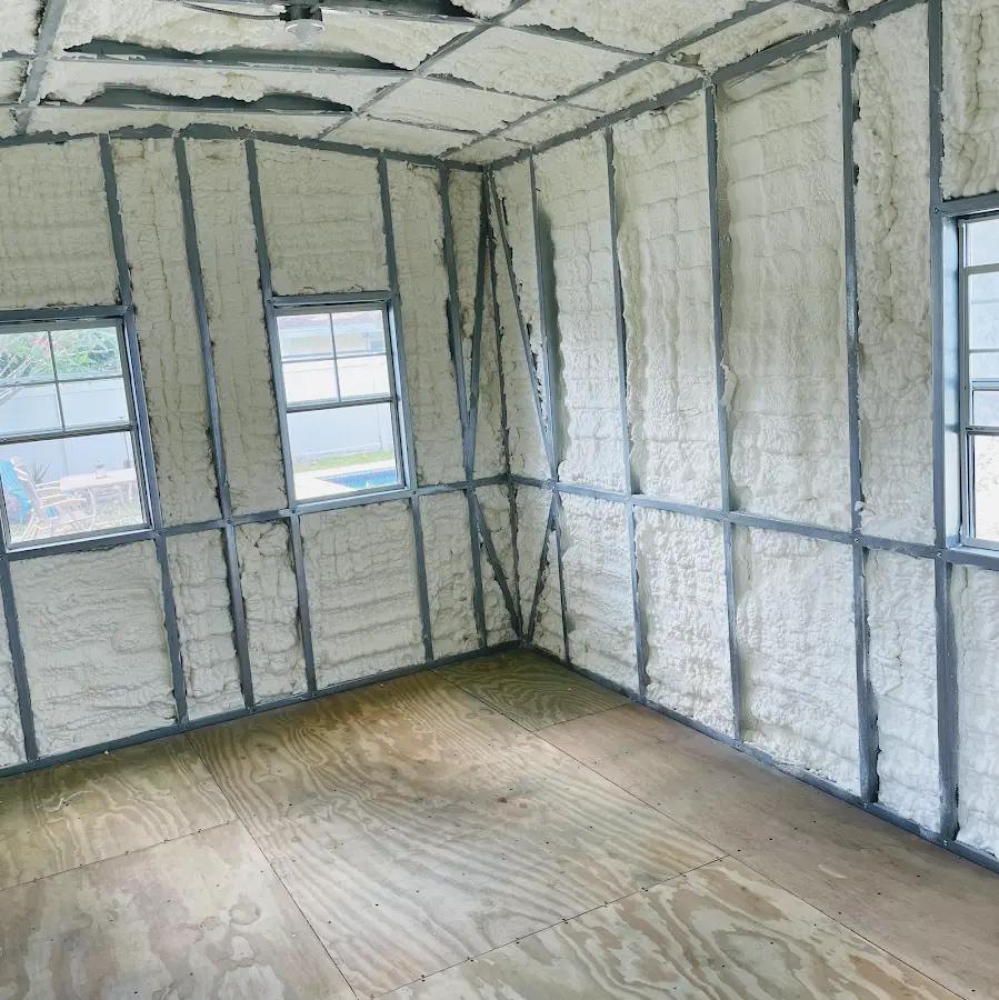 Closed-cell spray foam insulation applied to wall cavities in a residential project in Delano